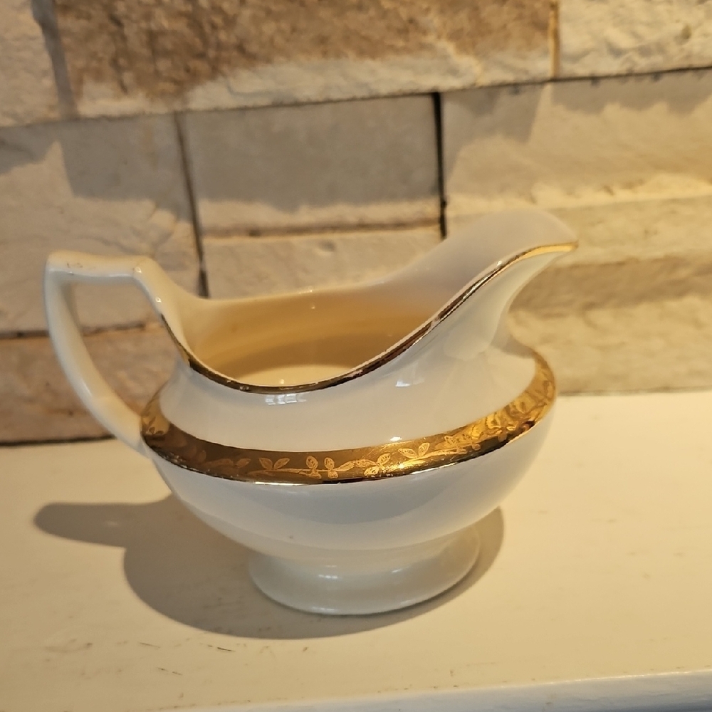 Elegant White and Gold Creamer